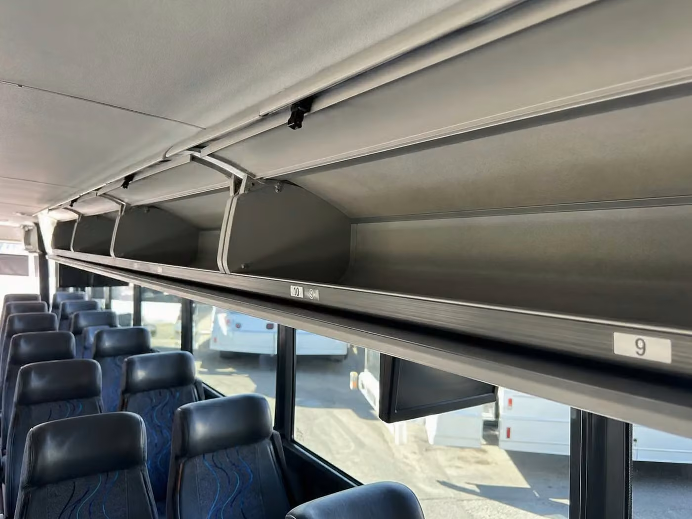 rome 25 passenger minibus overhead storage