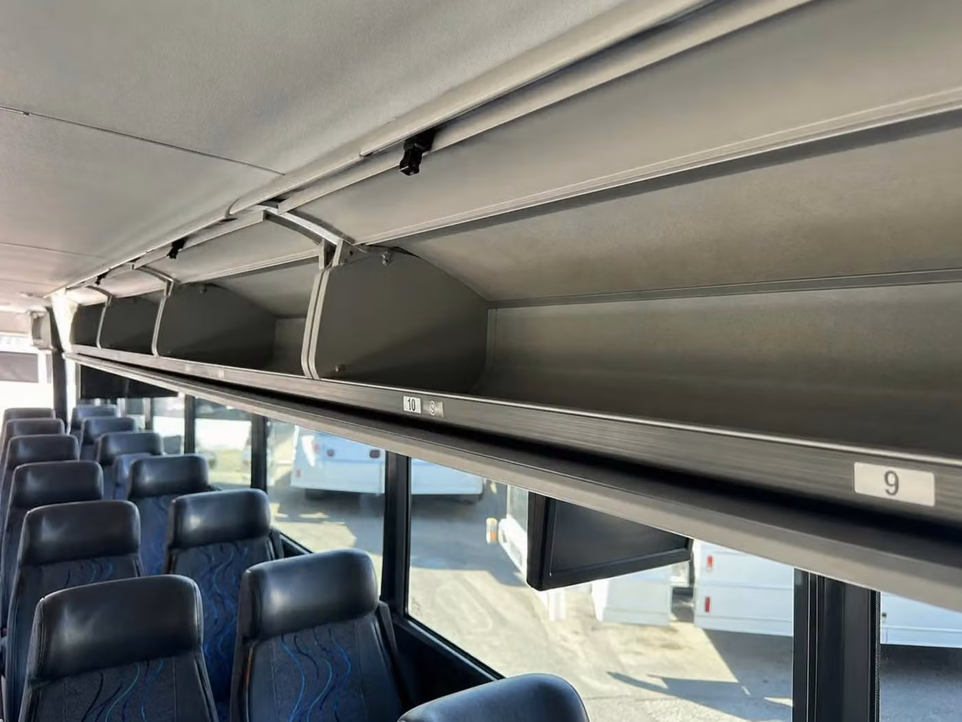 rome 28 passenger minibus overhead storage