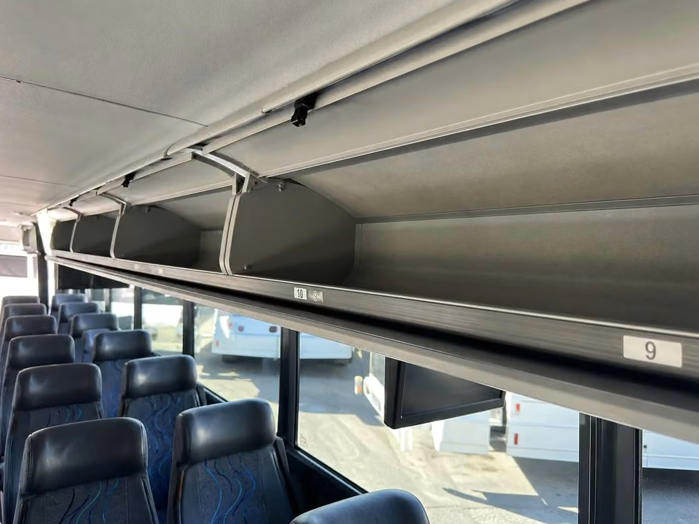 rome 35 passenger minibus overhead storage