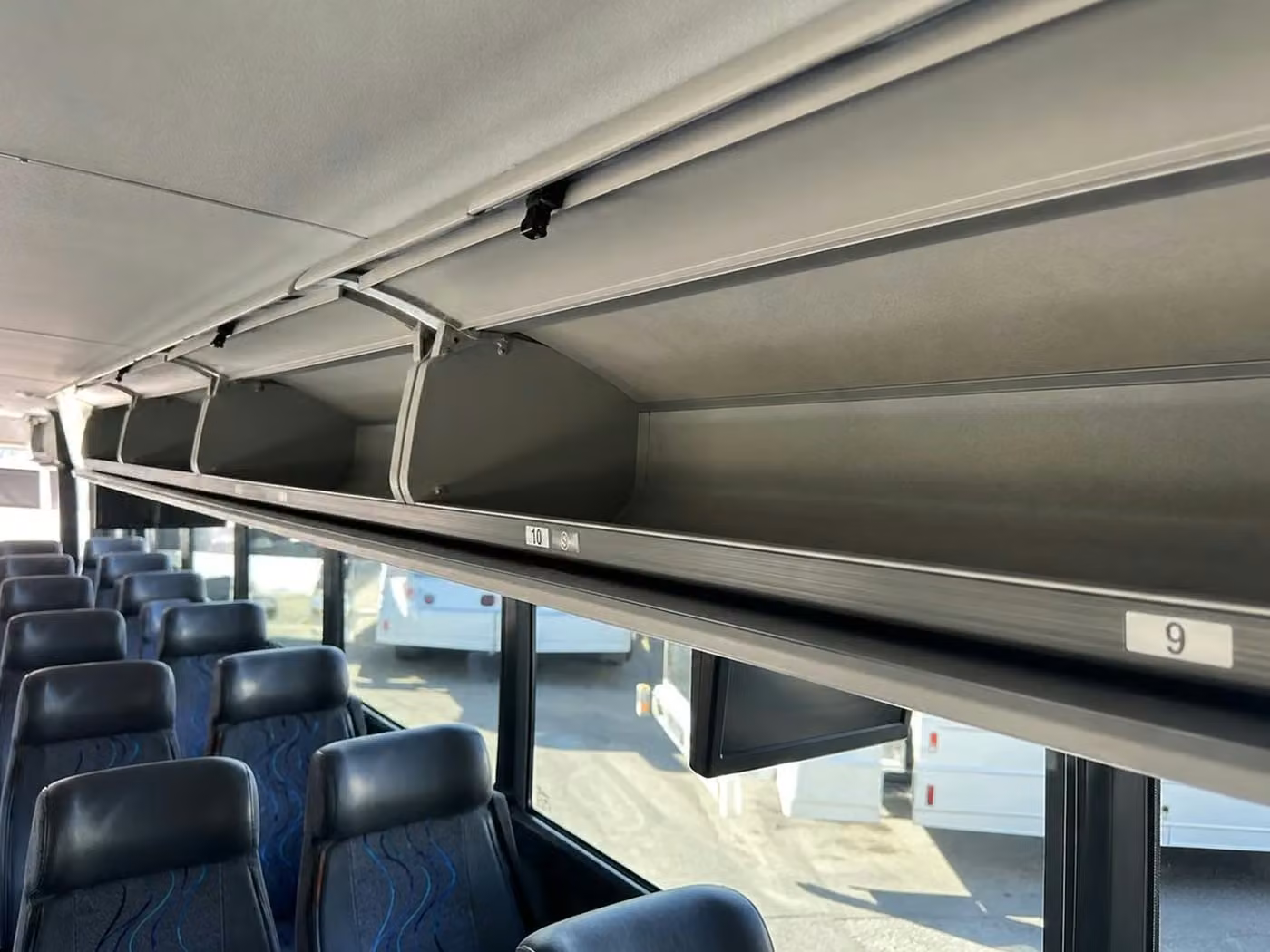 rome charter bus overhead storage